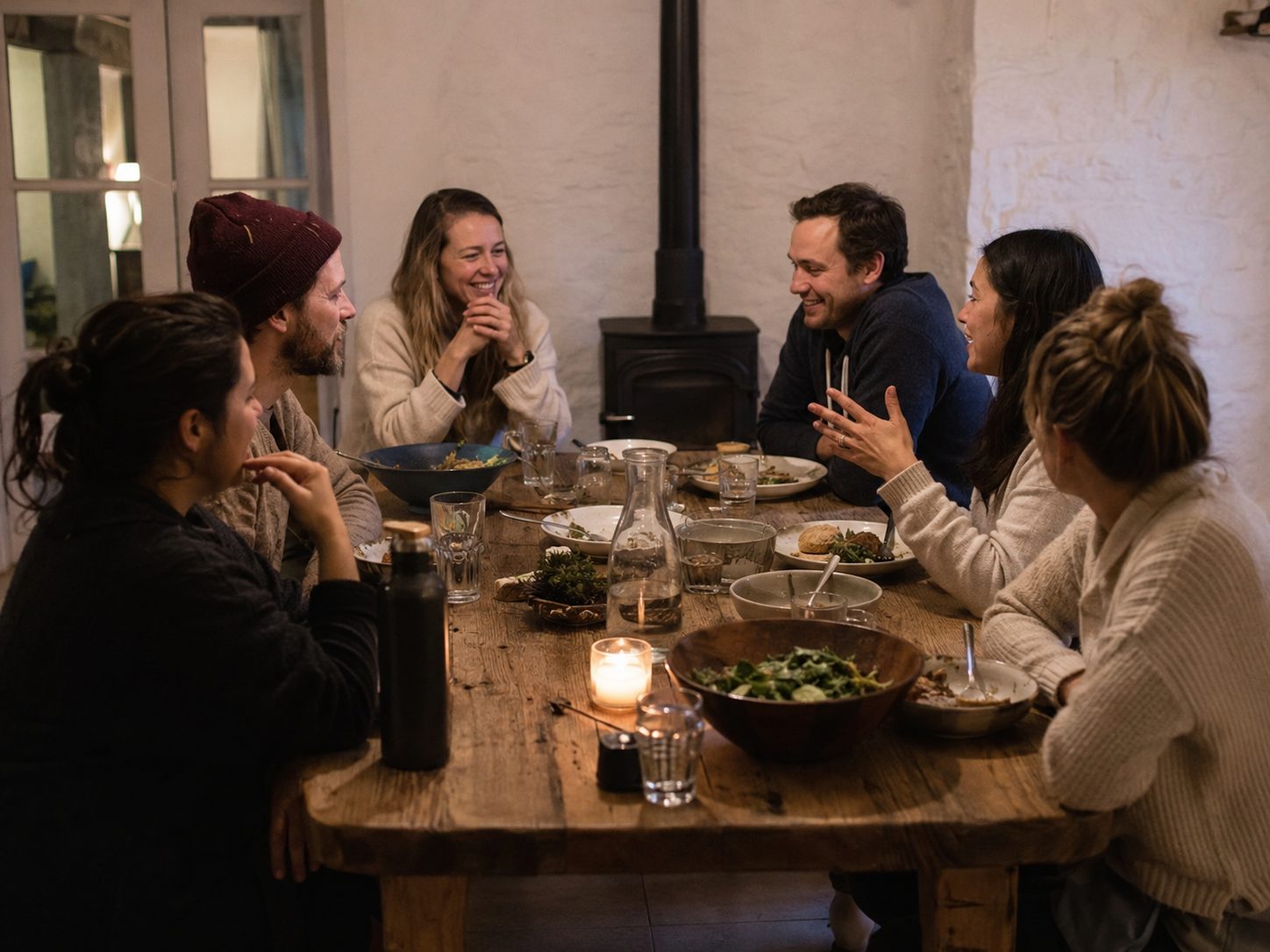 Warm candlelit dinner table at the retreat